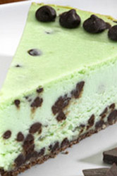 A slice of mint chocolate chip cheesecake.