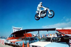 Evel Knievel jumping cars.