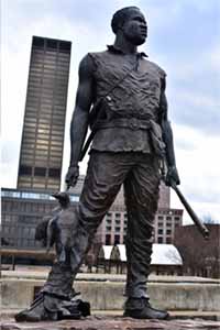 This statue honoring York stands in Belvedere/Riverfront Plaza in Louisville, Kentucky.  It was created by Ed Hamilton and dedicated in October 2003.
Photo: Creative Commons/Don Sniegowski